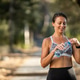 Woman Runner Taking A Break While Jogging In Park At Summer Day Woman Runner Taking A Break While Jogging In Park At Summer Day - PhotoDune Item for Sale