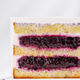 Colorful cake slice with sponge and berry filling on a neutral backdrop Colorful cake slice with sponge and berry filling on a neutral backdrop - PhotoDune Item for Sale