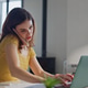 Multitasking employee talking smartphone while typing laptop at office closeup. Multitasking employee talking smartphone while typing laptop at office closeup. - PhotoDune Item for Sale