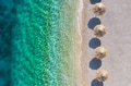 Aerial view on the beach and umbrellas. Vacation and adventure. Coast and blue water. Aerial view on the beach and umbrellas. Vacation and adventure. Coast and blue water. - PhotoDune Item for Sale