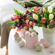 Easter Table with Tulip Bouquets, Eggs and Festive Decor. Cozy Spring Arrangement Easter Table with Tulip Bouquets, Eggs and Festive Decor. Cozy Spring Arrangement - PhotoDune Item for Sale