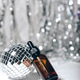 Bottles of cosmetics for skin care on a New Year's background. Bottles of cosmetics for skin care on a New Year's background. - PhotoDune Item for Sale