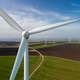 Aerial View of Wind Farm Turbines in Rural Green and Brown Fields Aerial View of Wind Farm Turbines in Rural Green and Brown Fields - PhotoDune Item for Sale