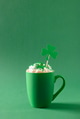 Irish coffee in green cup with whipped cream and sprinkles for St Patricks Day. Irish coffee in green cup with whipped cream and sprinkles for St Patricks Day. - PhotoDune Item for Sale