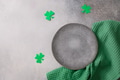 St Patrick's Day mock up with gray plate and green napkin. St Patrick's Day mock up with gray plate and green napkin. - PhotoDune Item for Sale