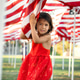 Happy American child holding flag on Memorial Day outdoor, National Holiday concept Happy American child holding flag on Memorial Day outdoor, National Holiday concept - PhotoDune Item for Sale