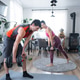Home workout for couples, man and woman stretch, modern bright interior, Home workout for couples, man and woman stretch, modern bright interior, - PhotoDune Item for Sale