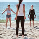 Group yoga session on Baltic Sea beach in bright daylight Group yoga session on Baltic Sea beach in bright daylight - PhotoDune Item for Sale