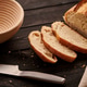 Homemade tartine bread on dark wooden table Homemade tartine bread on dark wooden table - PhotoDune Item for Sale