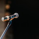 Close Up of Microphone Standing at Stage Before Concert Close Up of Microphone Standing at Stage Before Concert - PhotoDune Item for Sale