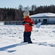 Child in winter clothes shoveling snow outdoors Child in winter clothes shoveling snow outdoors - PhotoDune Item for Sale