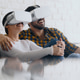 Young Couple Playing With Virtual Reality Young Couple Playing With Virtual Reality - PhotoDune Item for Sale
