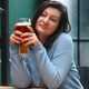 Woman Enjoying Beer in Rustic Bar Woman Enjoying Beer in Rustic Bar - PhotoDune Item for Sale