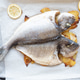 Roasted gilthead sea bream with potatoes and lemon Roasted gilthead sea bream with potatoes and lemon - PhotoDune Item for Sale