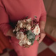 UnrecognizElderly woman holding a wedding bouquet ofable old woman holding a bouquet in a pink dress UnrecognizElderly woman holding a wedding bouquet ofable old woman holding a bouquet in a pink dress - PhotoDune Item for Sale