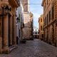Narrow cobblestone alley in Ciudadela, Menorca, Balearic Islands, Spain, inviting exploration Narrow cobblestone alley in Ciudadela, Menorca, Balearic Islands, Spain, inviting exploration - PhotoDune Item for Sale