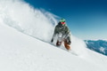 male snowboarder curved and brakes spraying loose deep snow on male snowboarder curved and brakes spraying loose deep snow on - PhotoDune Item for Sale