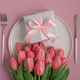 Gift Box with Tulips on Plate. Festive Romantic Flatlay Gift Box with Tulips on Plate. Festive Romantic Flatlay - PhotoDune Item for Sale