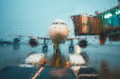 A busy airport in the rain A busy airport in the rain - PhotoDune Item for Sale