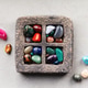 Colorful Tumbled Gemstones in Rustic Stone Tray on Light Surface Colorful Tumbled Gemstones in Rustic Stone Tray on Light Surface - PhotoDune Item for Sale
