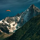 Orange paragliding in the mountains Orange paragliding in the mountains - PhotoDune Item for Sale