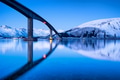 Bridge and reflection on the water surface. Natural landscape in the Lofoten islands, Norway. Bridge and reflection on the water surface. Natural landscape in the Lofoten islands, Norway. - PhotoDune Item for Sale