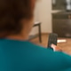 Older woman unrecognisable using TV remote control Older woman unrecognisable using TV remote control - PhotoDune Item for Sale