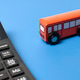 Transportation Budget and Public Transit Cost Calculation with Toy Bus and Calculator Transportation Budget and Public Transit Cost Calculation with Toy Bus and Calculator - PhotoDune Item for Sale