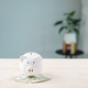 White ceramic piggy bank on dollar bills shows economy, money, bank, piggy, finance, global, stock, White ceramic piggy bank on dollar bills shows economy, money, bank, piggy, finance, global, stock, - PhotoDune Item for Sale