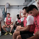 Soccer team listening to coach in locker room Soccer team listening to coach in locker room - PhotoDune Item for Sale