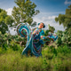 Traditional Mexican folkloric dancer with turquoise dress and cactus landscape Traditional Mexican folkloric dancer with turquoise dress and cactus landscape - PhotoDune Item for Sale