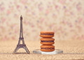 Macarons french dessert. Eiffel Tower on gold Macarons french dessert. Eiffel Tower on gold - PhotoDune Item for Sale