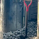 Shovel in coal bin inside of train engine Shovel in coal bin inside of train engine - PhotoDune Item for Sale