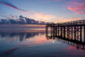 Pier on Mobile Bay at sunset Pier on Mobile Bay at sunset - PhotoDune Item for Sale