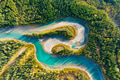 A drone view of the river in the woods. An aerial view of an autumn forest. Alberta, Canada. A drone view of the river in the woods. An aerial view of an autumn forest. Alberta, Canada. - PhotoDune Item for Sale