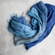 Soft textile scarf on the concrete background Soft textile scarf on the concrete background - PhotoDune Item for Sale