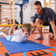 Motoric corrective strength exercise using a training stick Motoric corrective strength exercise using a training stick - PhotoDune Item for Sale