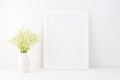 White frame mockup with Rue Anemone flowers White frame mockup with Rue Anemone flowers - PhotoDune Item for Sale
