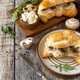 Freshly baked croissants with mushrooms and ricotta on rustic wooden table setting. Copy space. Freshly baked croissants with mushrooms and ricotta on rustic wooden table setting. Copy space. - PhotoDune Item for Sale