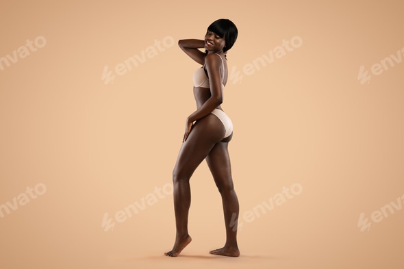 Sexy african american model showing her beautiful body Stock Photo by Prostock-studio Sexy african american model showing her beautiful body Stock Photo by Prostock-studio
