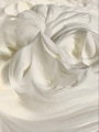 White dairy product swirl closeup. Creamy healthy natural food macro photography. Top view. White dairy product swirl closeup. Creamy healthy natural food macro photography. Top view. - PhotoDune Item for Sale