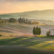 Misty Sunset over Santa Luce Hills with Cypress Trees, Tuscany, Italy Misty Sunset over Santa Luce Hills with Cypress Trees, Tuscany, Italy - PhotoDune Item for Sale