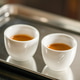 Close up of coffee cups on counter in modern cafe, freshly prepared for customers. Close up of coffee cups on counter in modern cafe, freshly prepared for customers. - PhotoDune Item for Sale