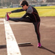 Athlete woman stretching leg Athlete woman stretching leg - PhotoDune Item for Sale