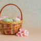 Wicker Easter Basket with Pastel Eggs and Flowers. Soft Spring Decor Wicker Easter Basket with Pastel Eggs and Flowers. Soft Spring Decor - PhotoDune Item for Sale