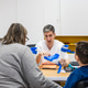 Orthopedist explaining orthosis use to child and parent Orthopedist explaining orthosis use to child and parent - PhotoDune Item for Sale