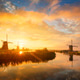 Summer morning landscape with windmills in Holland at sunrise Summer morning landscape with windmills in Holland at sunrise - PhotoDune Item for Sale