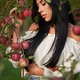 Young woman thinking, while leaning on apple tree branches in autumn. Young woman thinking, while leaning on apple tree branches in autumn. - PhotoDune Item for Sale