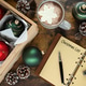 Writing a Christmas List with decorations and hot chocolate cocoa Writing a Christmas List with decorations and hot chocolate cocoa - PhotoDune Item for Sale