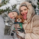 Posing mother with teen son and maltipoo dog near snowy fir tree, hugs, smiles, winter holiday Posing mother with teen son and maltipoo dog near snowy fir tree, hugs, smiles, winter holiday - PhotoDune Item for Sale